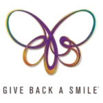 Give Back a Smile logo representing a charitable dental program that restores smiles for survivors of domestic violence